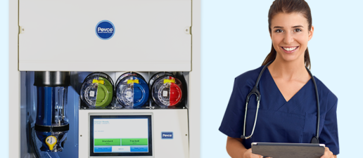 Female clinician standing next to delivery management station