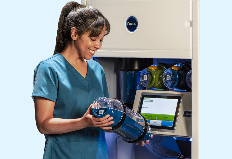 Female clinician placing beam into delivery management station
