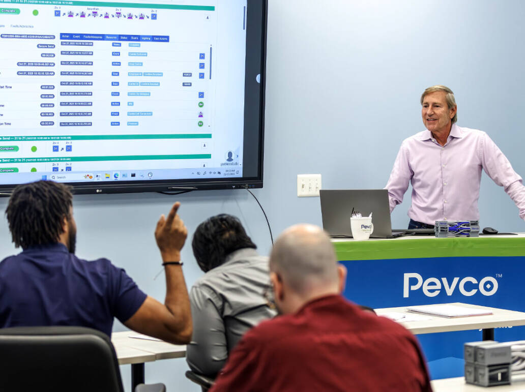 Instructor presenting on a screen to the class
