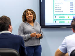 Female instructor talking to the class
