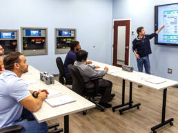 Male instructor talking to the class